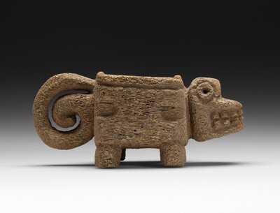 Feline effigy mortar, carved from bone