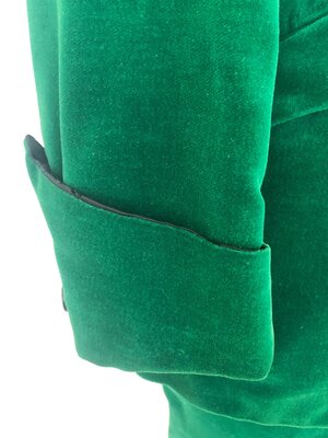 Green velveteen pants suit cuff detail