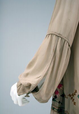 Annette Warner’s mauve, chiffon dress (left sleeve)