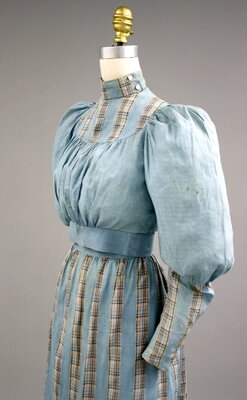Dress B. Blue cotton dress worn by Mary Winifred Huntley (quarter)