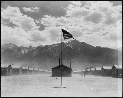Dust storm at this War Relocation Authority center, where evacuees of Japanese ancestry are spending the duration
