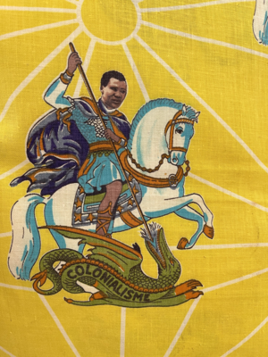 Textile, print on yellow background, President of Guinea Slaying Colonialism Detail