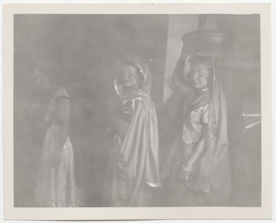 Betty Carpenter '41 and Dhimatria Tassi '39 backstage at “Costume of Many Lands” in 1938.
