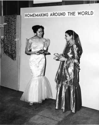 Mrs. Shoukat Zafar, right, of Lahore, Pakistan, and Miss Aurora Fronda of Los Banos, P.I., wore their native dresses for a 1958 Farm and Home Week program. 