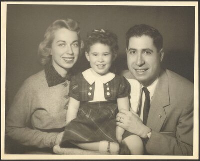 Portrait of Joyce, her husband Milton, and their daughter Lisa, circa 1956.