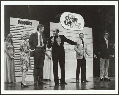 Photograph of Dr. Brothers, Frank Sinatra, Dean Martin, and Mayor John Lindsay with the New York Lottery. Circa 1969. 
