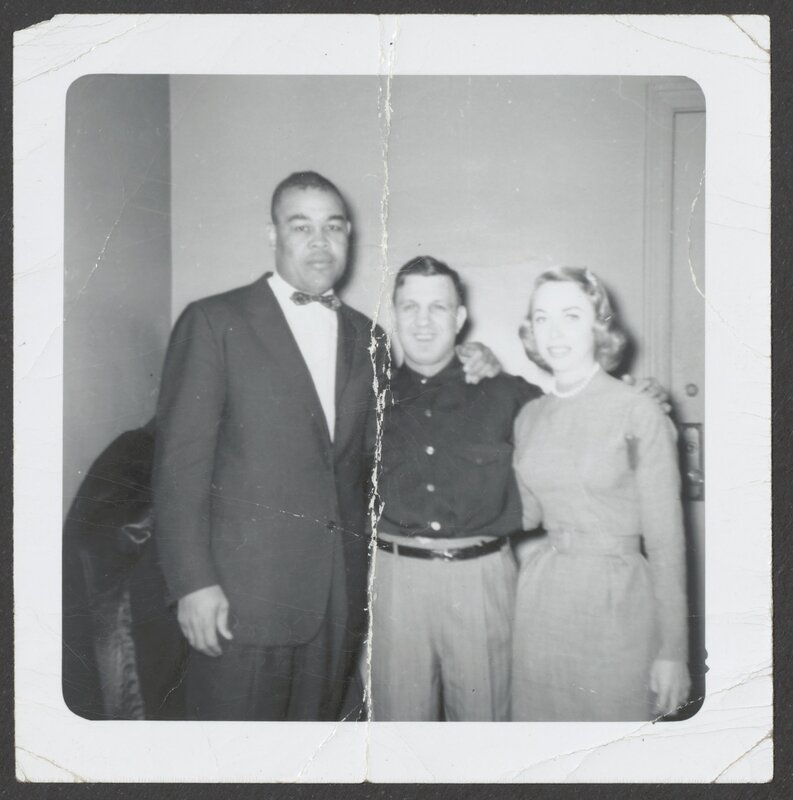 Photograph of Dr. Brothers with two former boxers, circa December 1955.