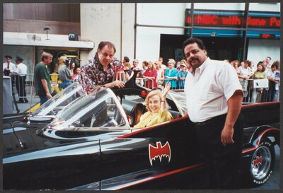Photograph of Brothers in the original Batmobile. 2001.