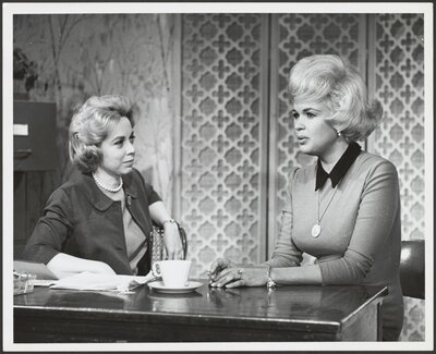 Photograph of Brothers interviewing Jayne Mansfield. Circa 1965.