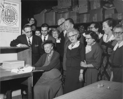 Eleanor Roosevelt sews in the union label