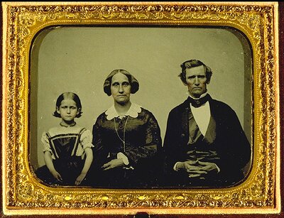 Ezra and Mary Ann Cornell with their daughter Emma. 